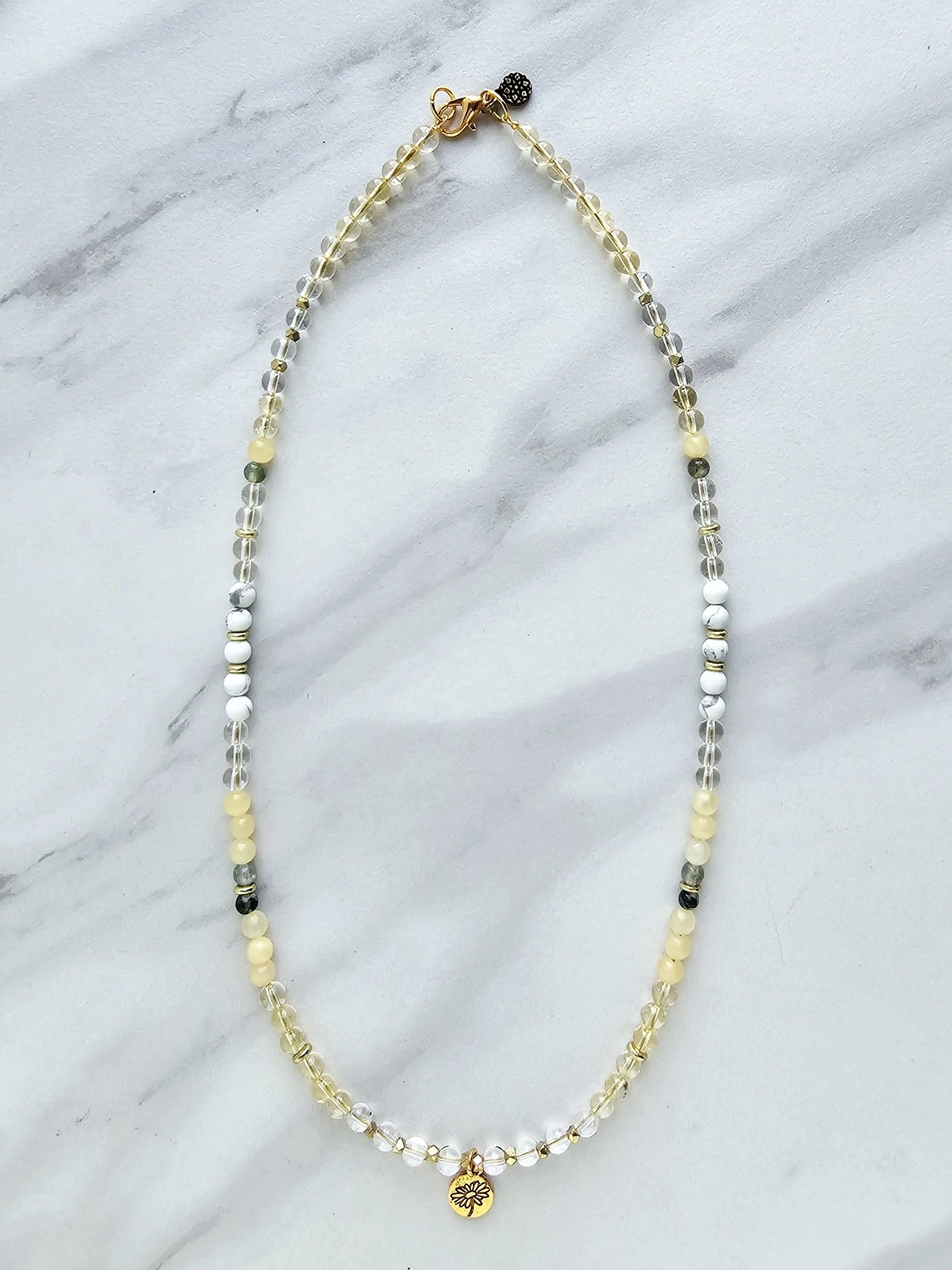 April birth flower necklace daisy moxie malas