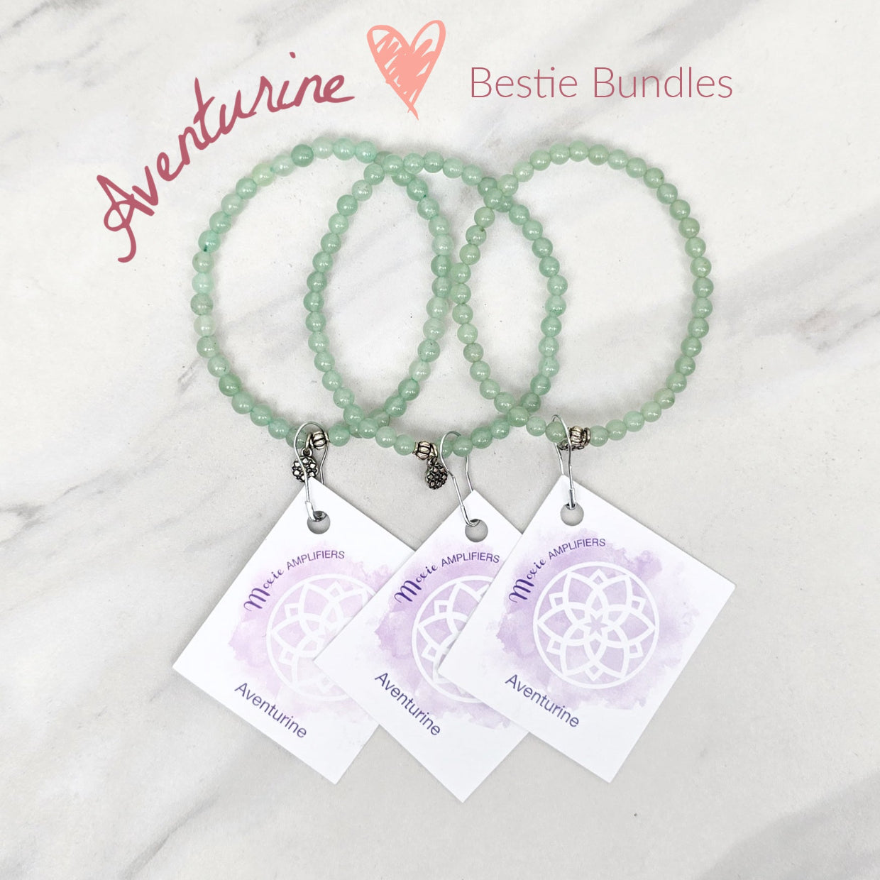 green beaded bracelets with matching cards on a marble surface galentine valentine bracelet bundle