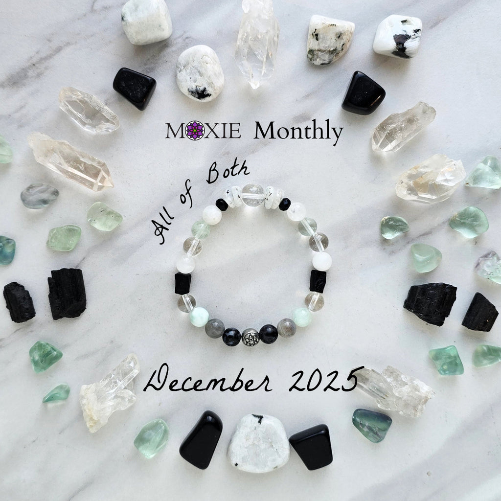 Bracelet with crystals on a marble surface, featuring 'Moxie Monthly' branding. all of both protection crystal bracelet intuition
