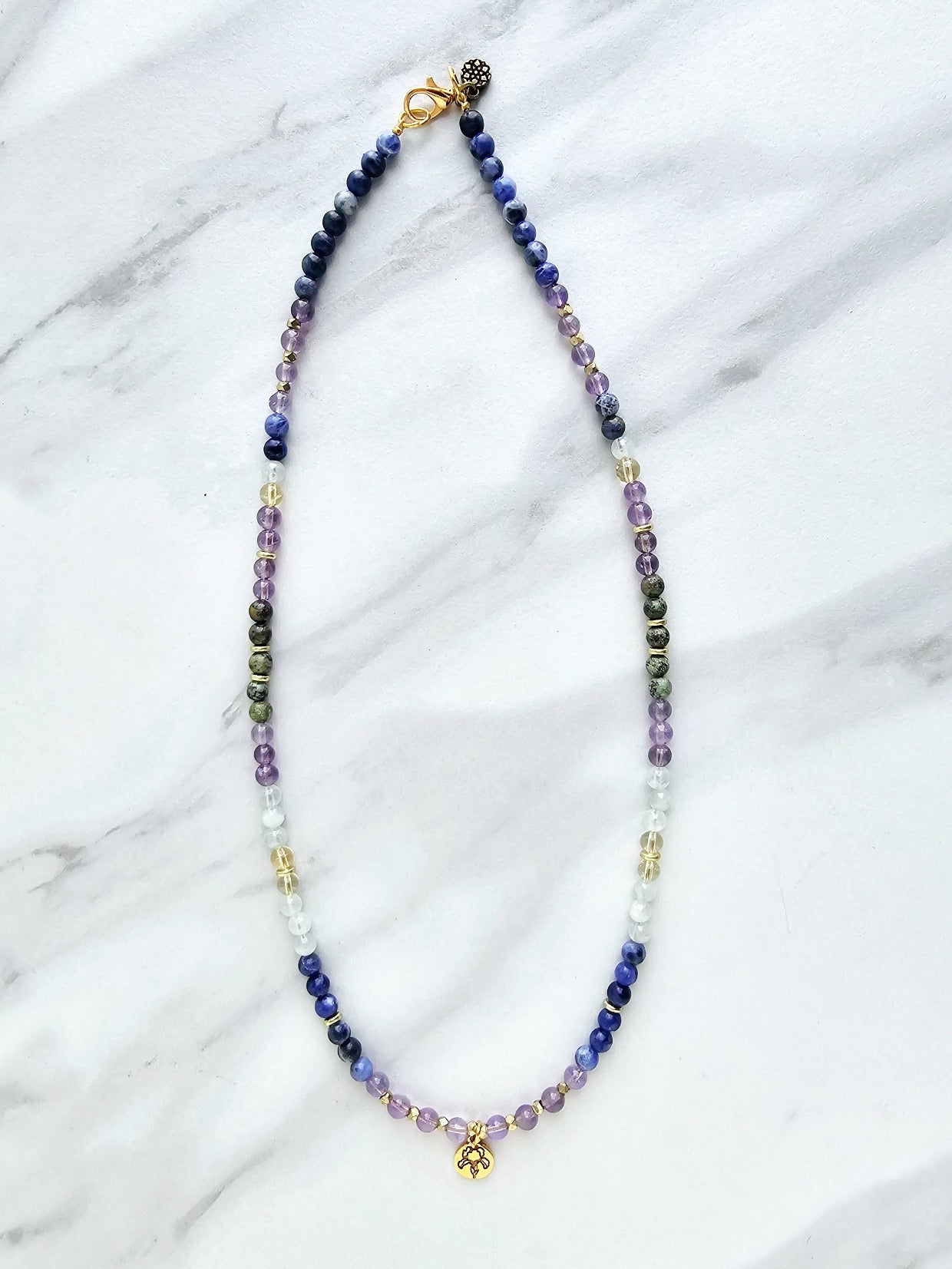 february birth flower neckace iris moxie malas