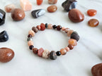 a healing home holiday exclusive, lake superior stone, crystal energy bracelet, oranges, rusts, burgundy, and gray lake stone, agates