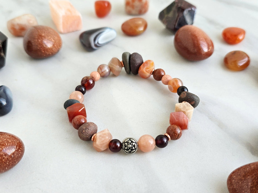 a healing home holiday exclusive, lake superior stone, crystal energy bracelet, oranges, rusts, burgundy, and gray lake stone, agates