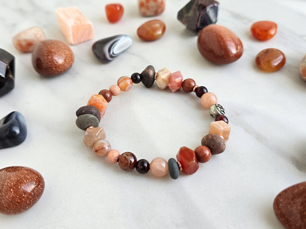 a healing home holiday exclusive, lake superior stone, crystal energy bracelet, oranges, rusts, burgundy, and gray lake stone, agates