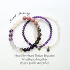 Three beaded bracelets with different colored beads on a white background, labeled 'Heal My Heart Thrive Bracelet'.