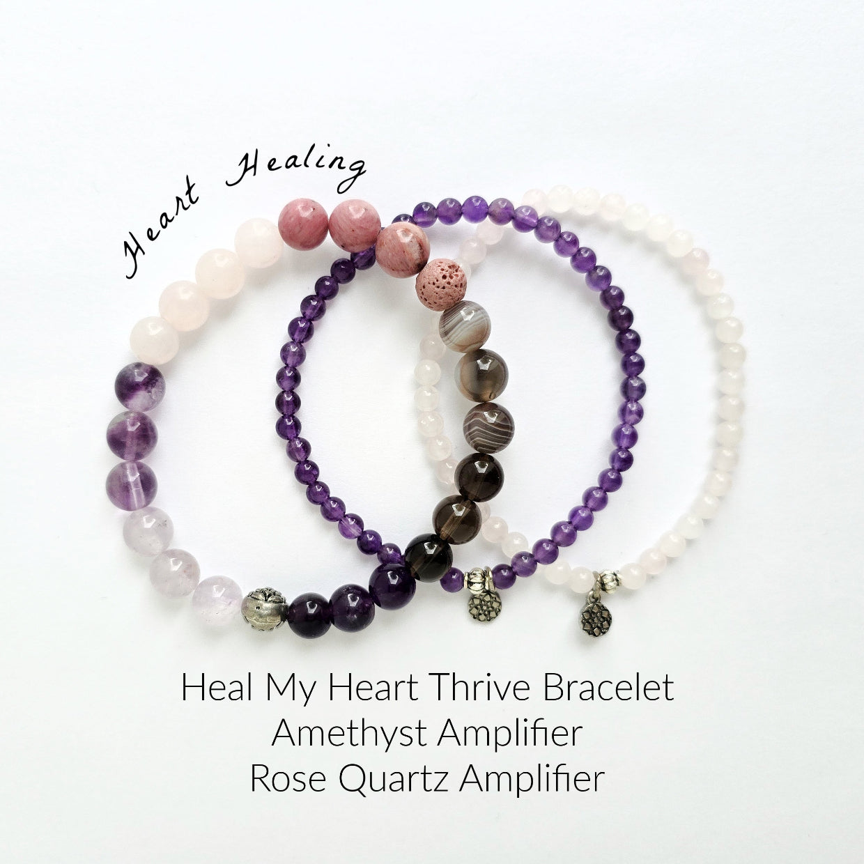 Three beaded bracelets with different colored beads on a white background, labeled 'Heal My Heart Thrive Bracelet'.