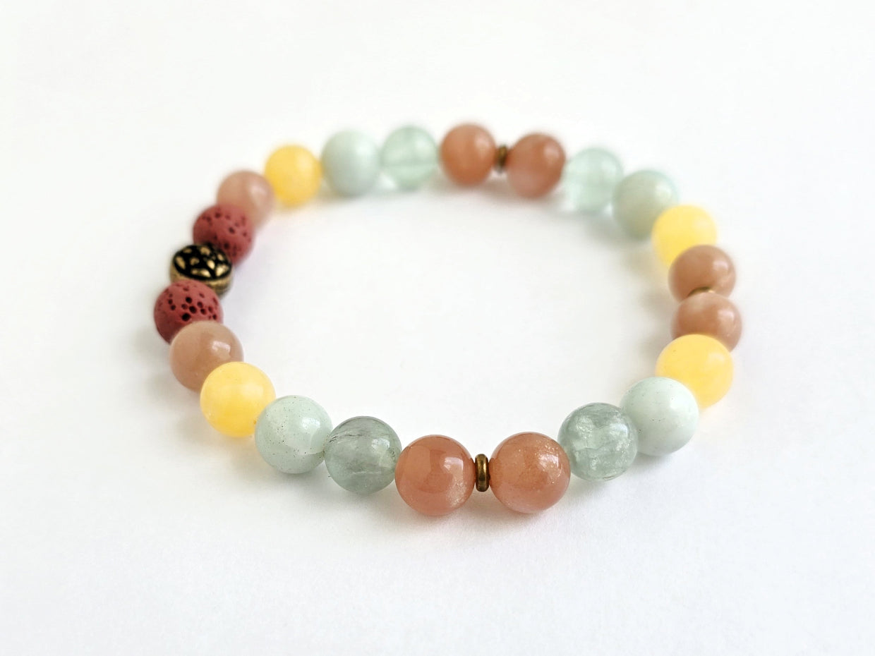 Multicolored beaded bracelet on a white background with 'Hope' text.
