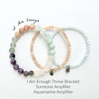 Three beaded bracelets with different colored beads on a white background