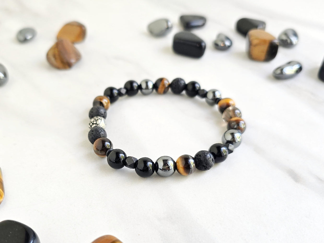 Bracelet with stones on a marble background, promoting a fundraiser for Joe Spannbauer bracelet
