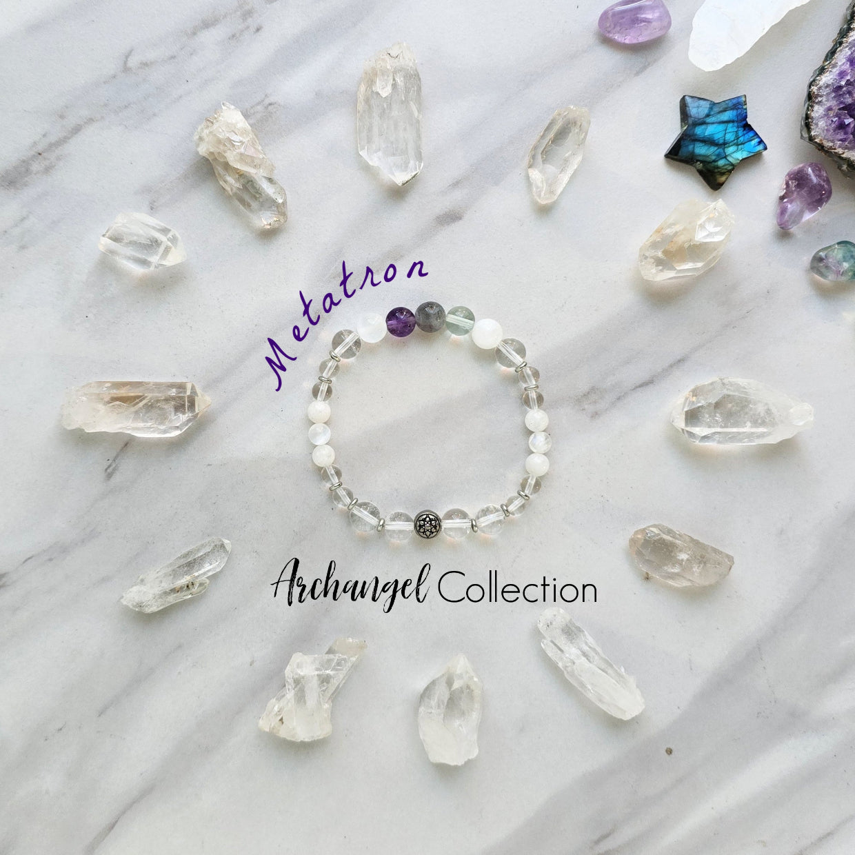 Bracelet with crystals on a marble surface, featuring 'Metatron' and 'Archangel Collection'. Archangel Metatron crystal bracelet