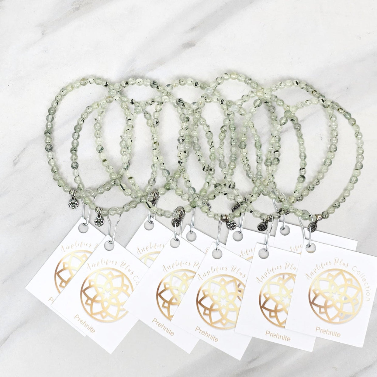 Three beaded bracelets on white cards with 'Prehnite' and 'Bestie Bundles' text on a marble background. valentines gifts galentines day