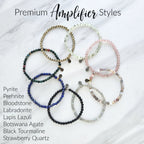 Set of beaded bracelets on a white marble surface with text indicating different stone types. moxie premium amplifiers