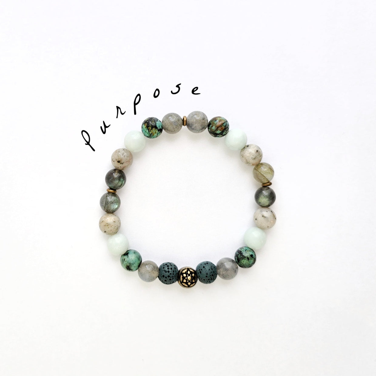 Beaded bracelet with 'purpose' text on a white background