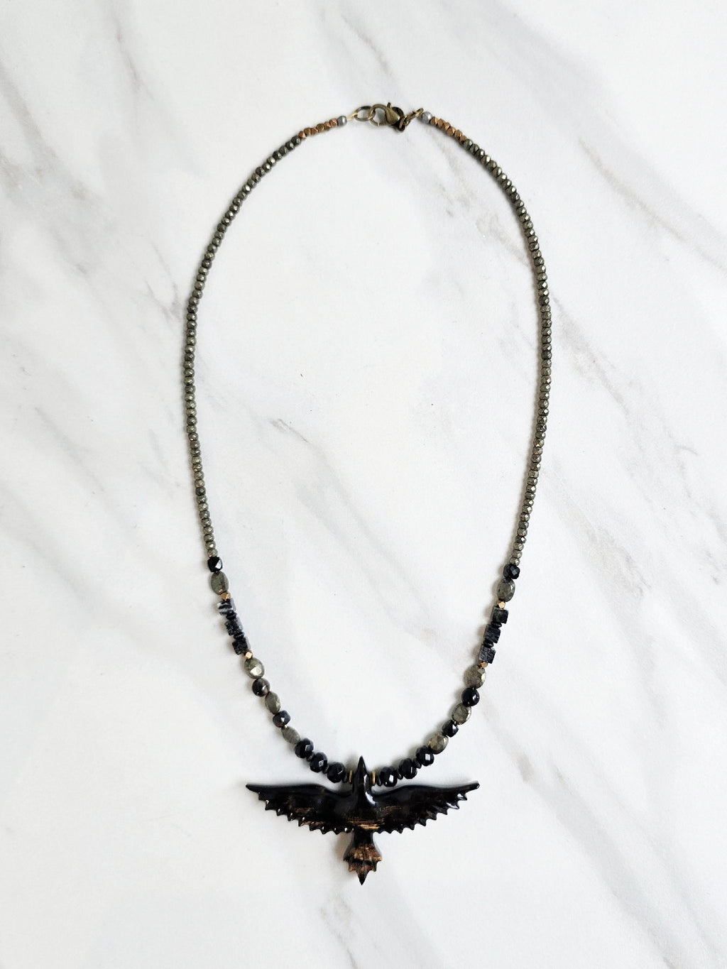 raven talisman necklace pyrite obsidian silver leaf jasper