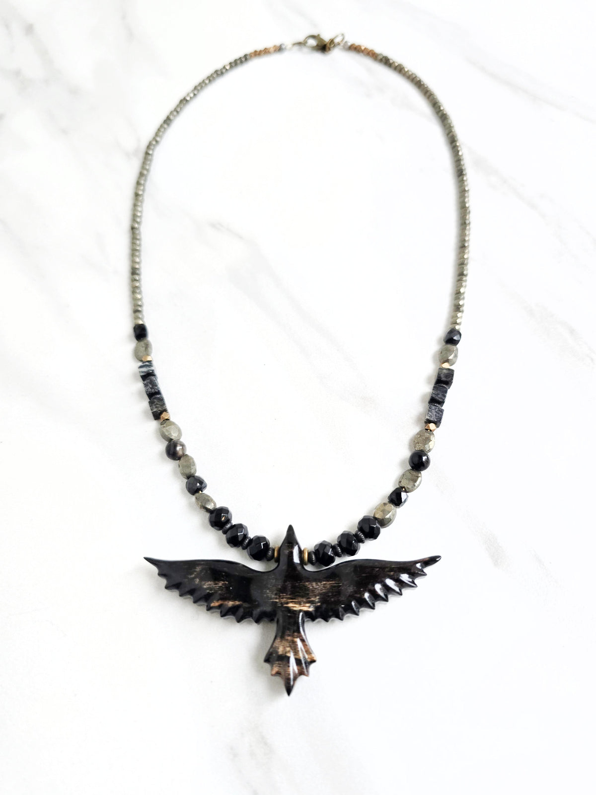 raven talisman necklace pyrite obsidian silver leaf jasper