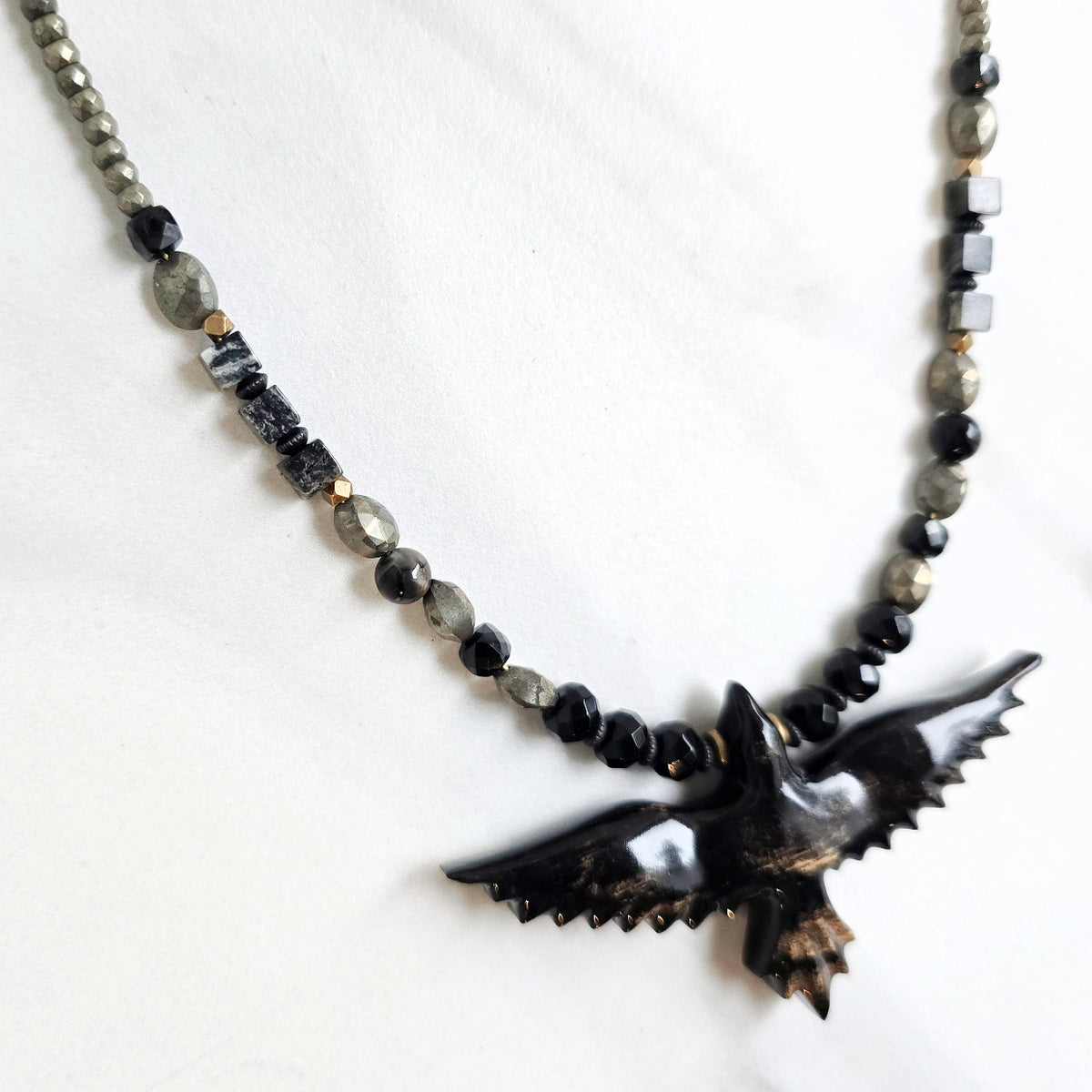 raven talisman necklace pyrite obsidian silver leaf jasper