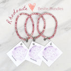 Three pink rhodonite beaded bracelets on cards with 'Rhodonite' text, branded 'Rhodonite Bestie Bundles' on a marble background. valentine gifts galentines day