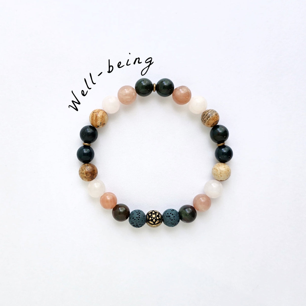 Beaded bracelet with various colored beads on a white background, labeled 'Well-being'.
